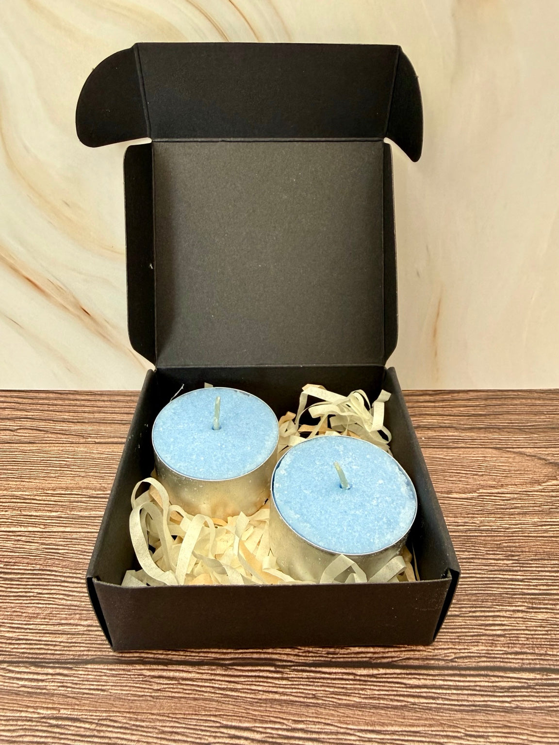 Two blue tealights