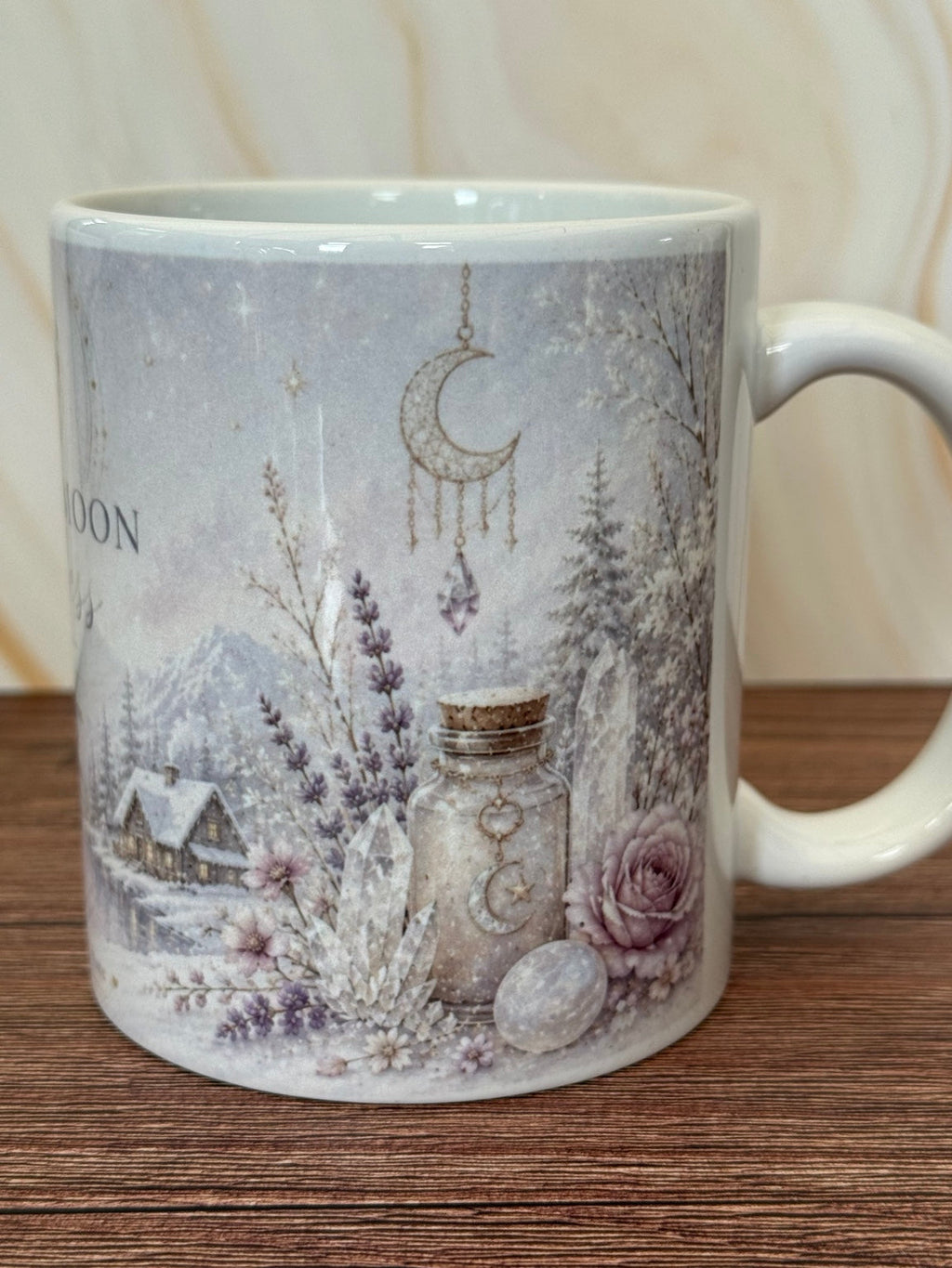 Winter Moon Goddess mug with winter landscape and moon charm illustration