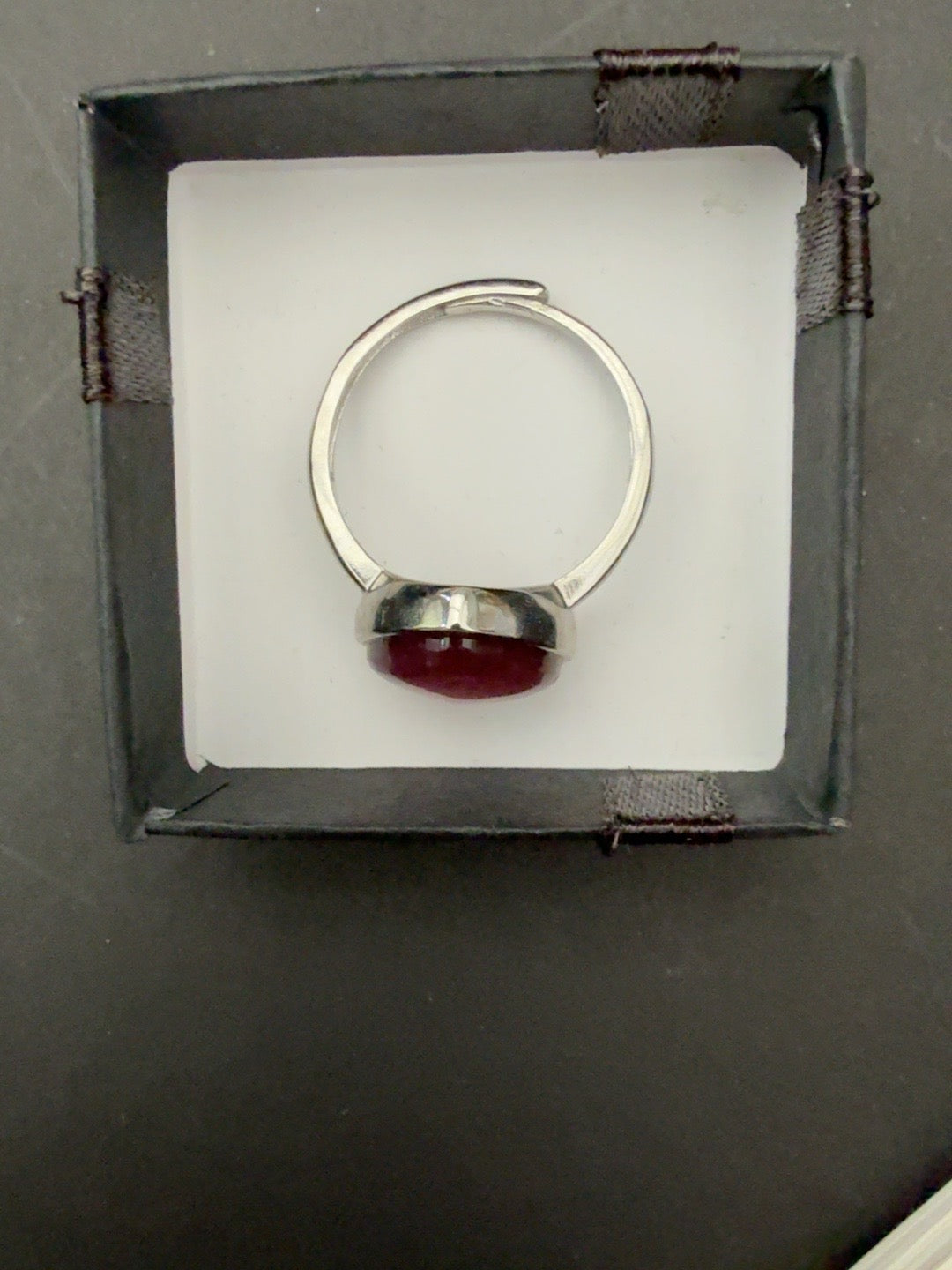 Actual adjustable stainless steel ring band viewed from behind