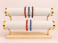 A Little Bit Braver crystal bracelet pairing and trio on stand