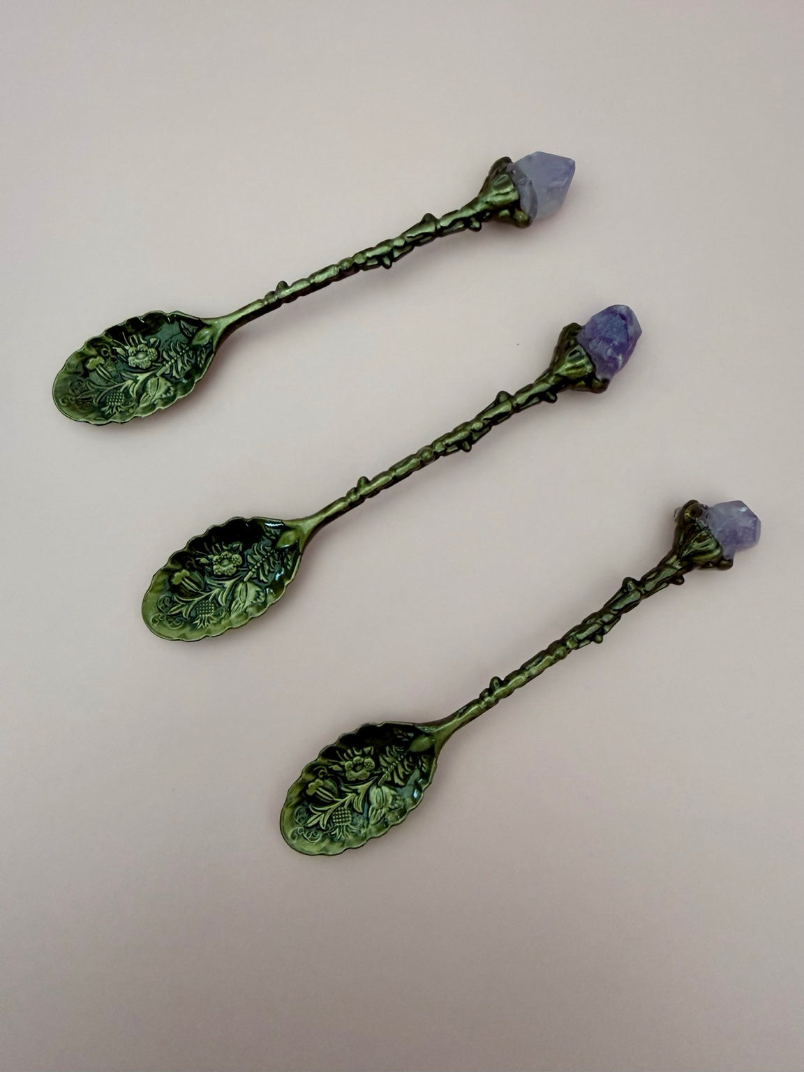 Three amethyst crystal potion spoons