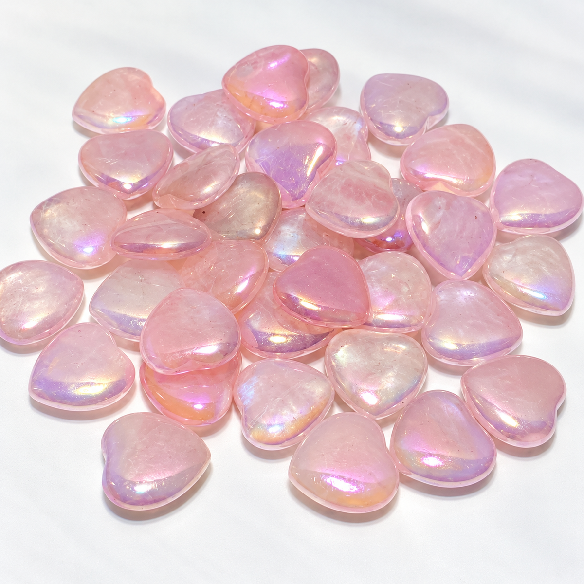 Aura Rose Quartz hearts showing soft pink iridescent shine