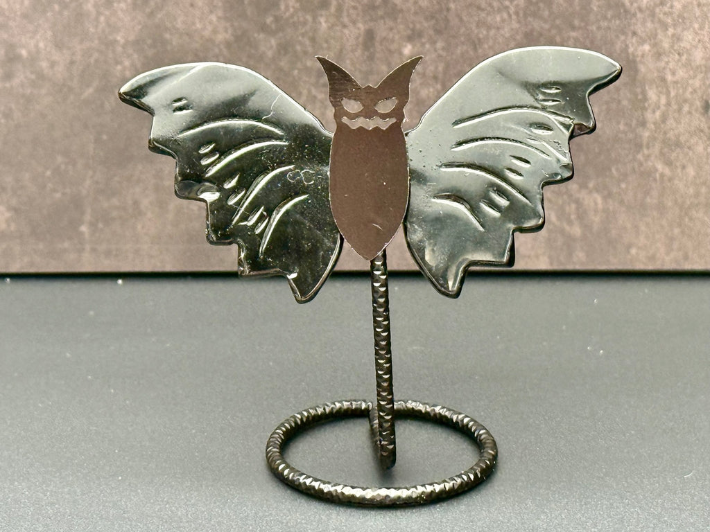 Obsidian bat on a stand included
