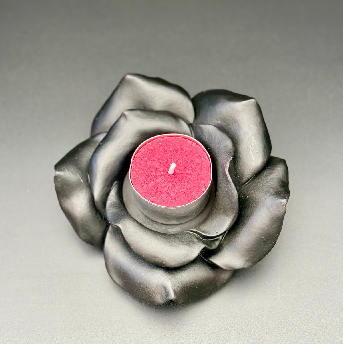Black rose tealight holder with red tealight