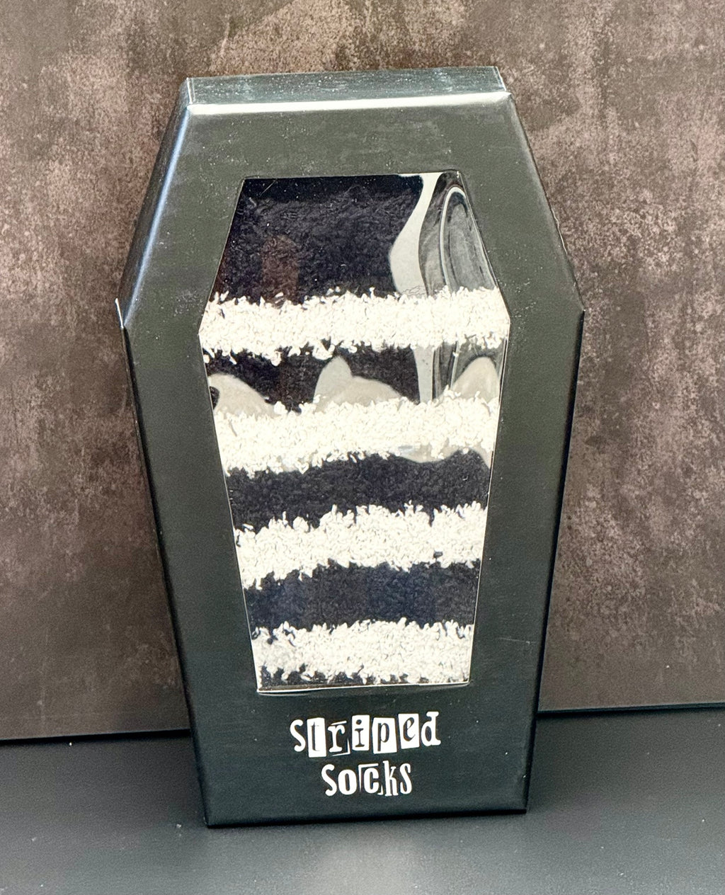 Striped socks in coffin gift box
