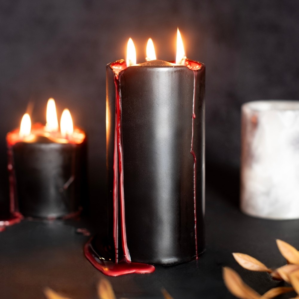 Supplier image showing Vampire Blood candle's red wax effect