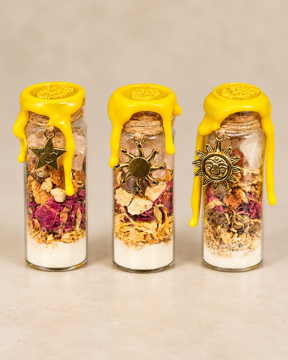Three handmade Happiness spell jars with different charms