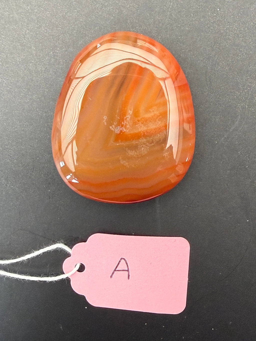 Banded Carnelian worry stone A reverse side