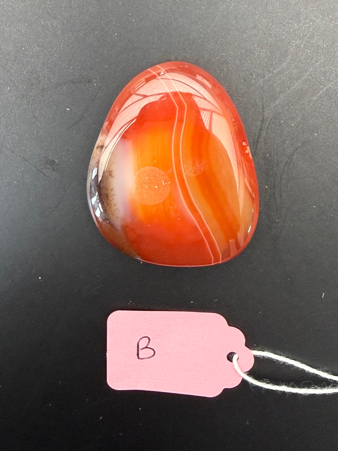 Reverse side of exact carnelian-B worry stone