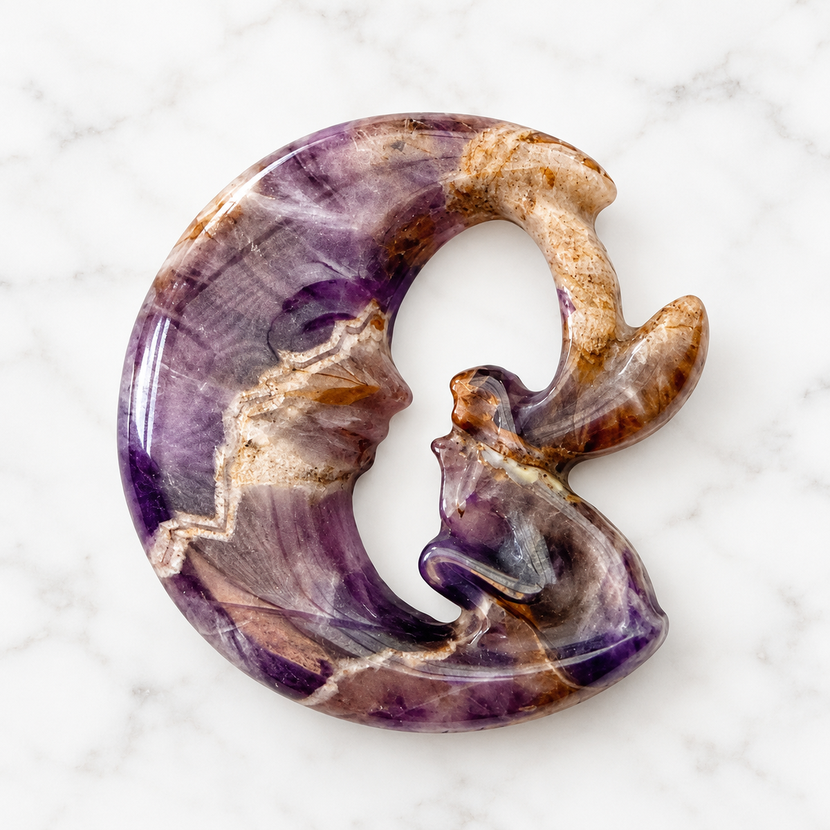Chevron Amethyst carved fairy in crescent moon - approx 55mm radius