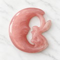 Rose Quartz carved fairy in crescent moon - approx 55mm radius