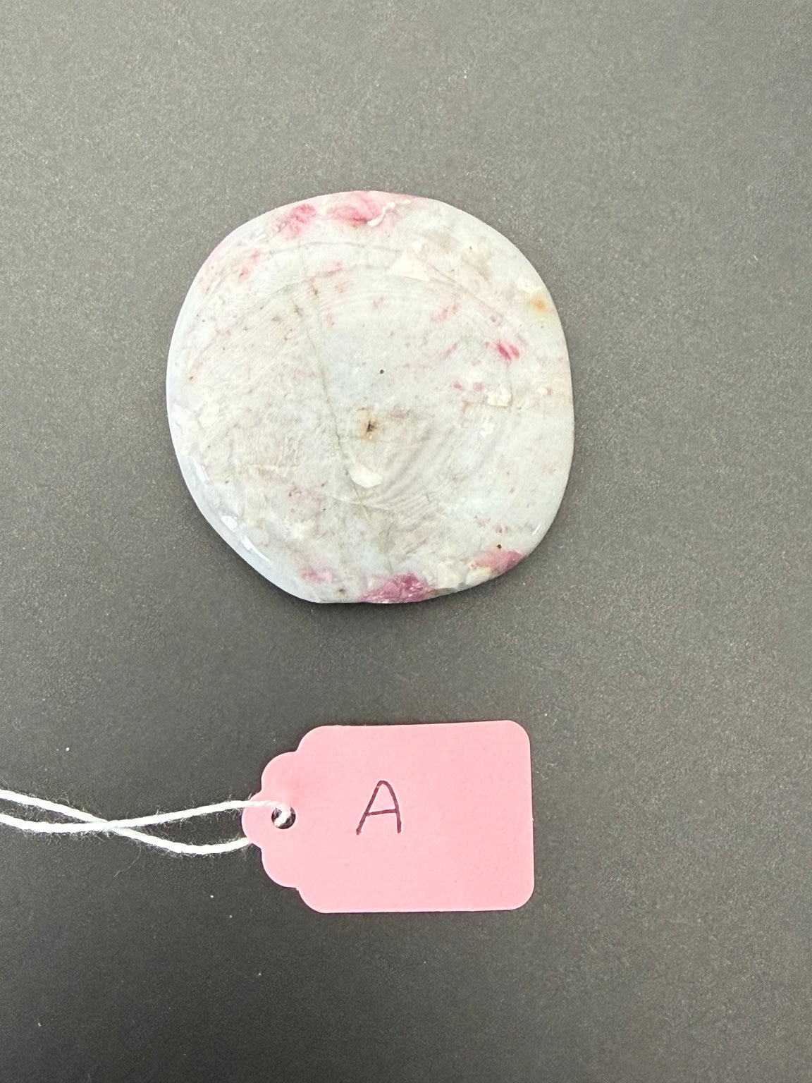 Reverse side of exact tourmaline-A worry stone
