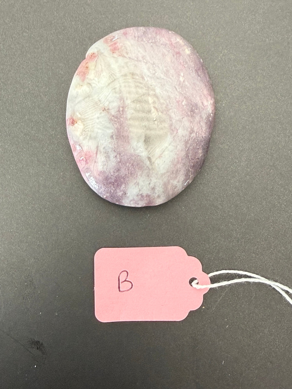 Reverse side of exact tourmaline-B worry stone