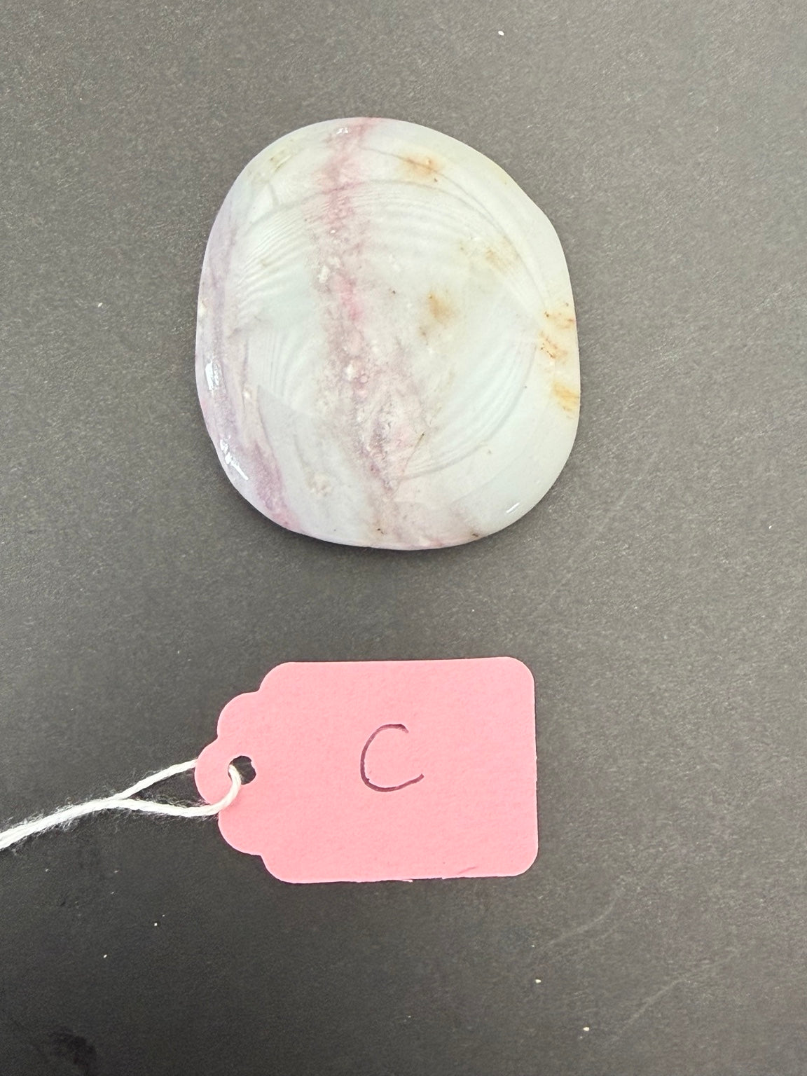 Reverse side of exact tourmaline-C worry stone