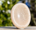 Moonstone palm worry stone close-up