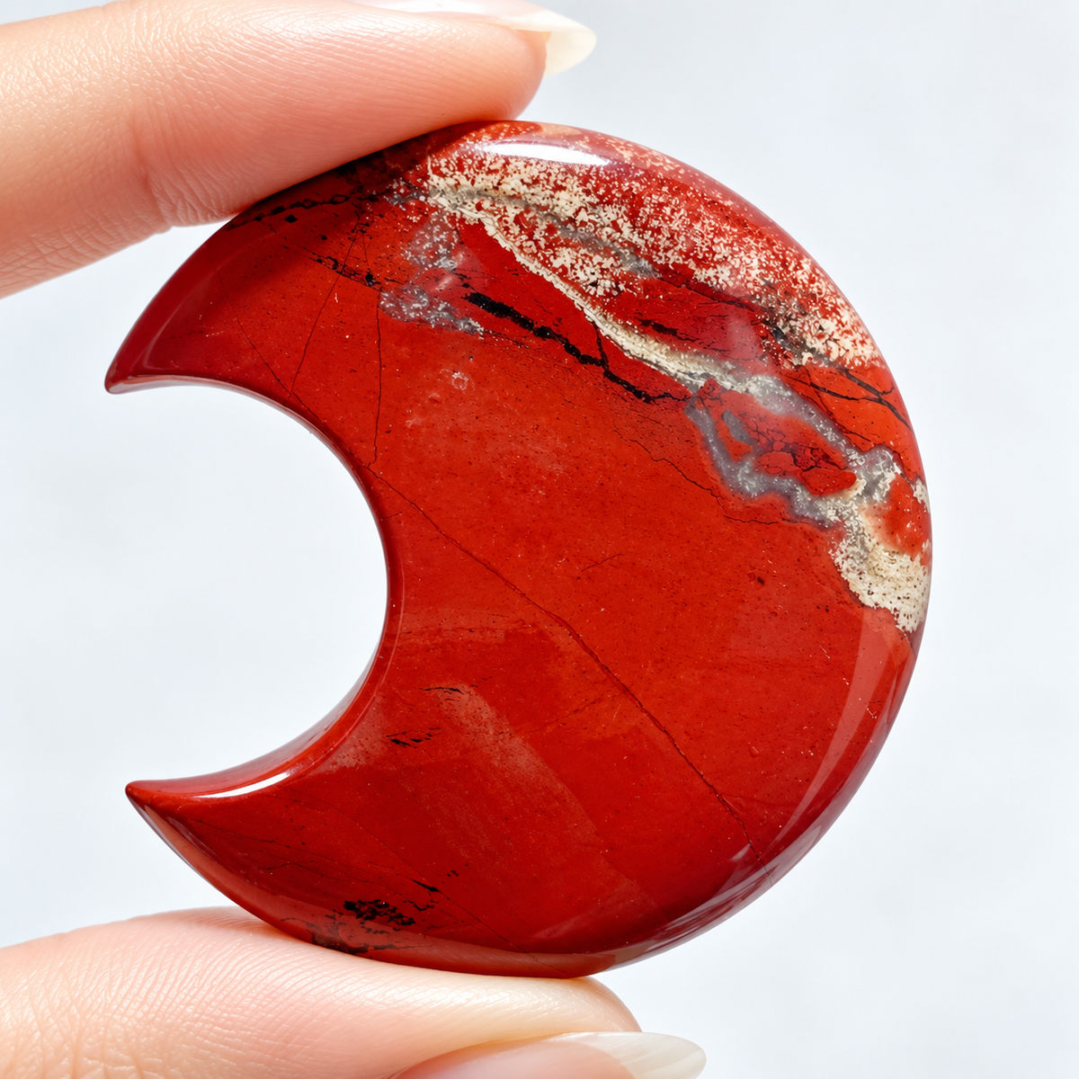 Red Jasper crescent moon close-up
